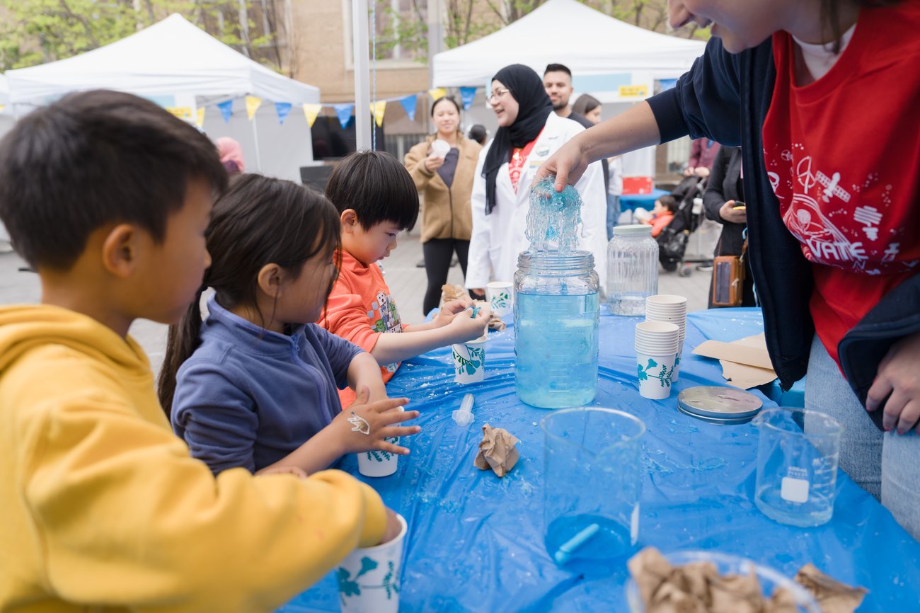 Kids at a table playing.